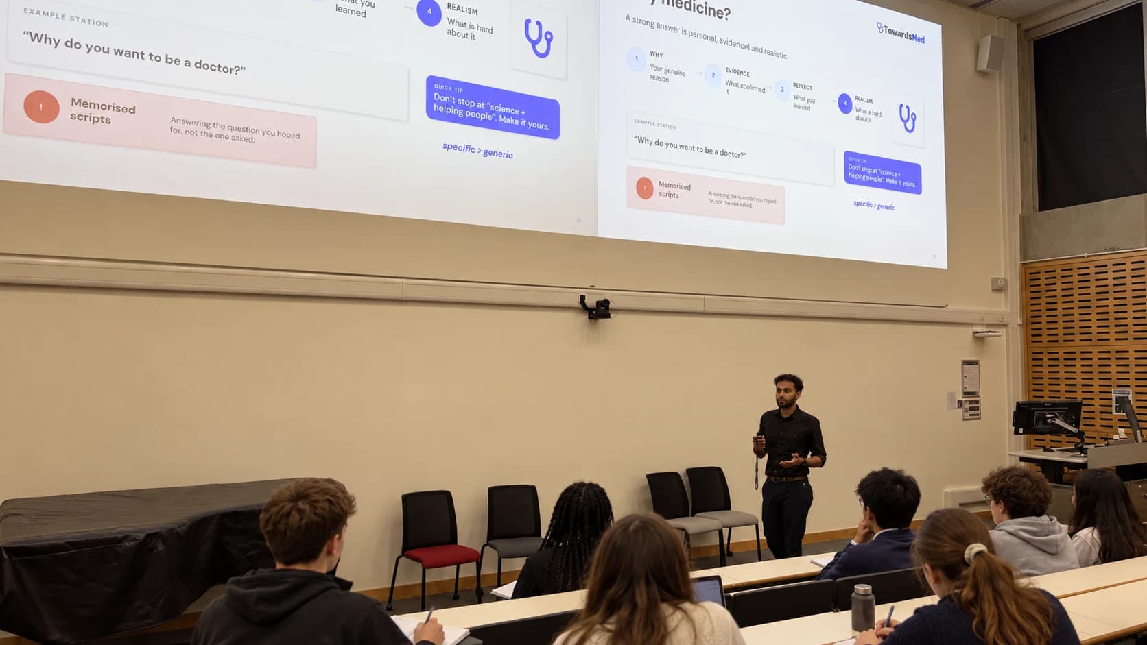 Students learning about medicine in a lecture room.